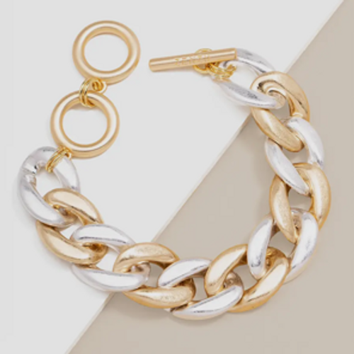 Two toned gold and silver burnished chain bracelet with chunky interlocking linkks and round toggle clasp.