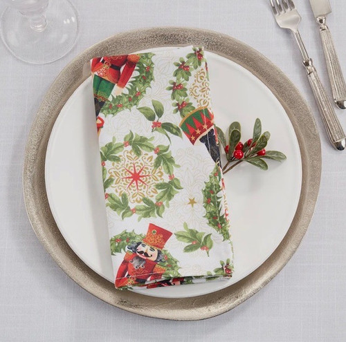 Nutcracker Christmas dinner napkins set of 4 featuring a classic red, green, white, and gold holiday design with nutcrackers and wreaths for an elegant Christmas table setting.