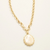 Mother of pearl pendant necklace with matte gold setting on gold chain