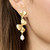 The Spartina 449 Ginko Leaf Dangle Earrings feature hammered 18kt. matte gold plated leaves accented with freshwater pearls for a timeless, elegant look. A classic 2.25-inch statement earring perfect for all year-round wear.