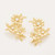 Gold floral stud earrings with faux pearl centers and glass crystal accents, offering elegant Southern charm in a refined statement.