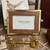 Elegant gold trimmed leather 4x6 picture frame with rich leather finish and adjustable gold metal stand, designed for tabletop display of family photos, wedding portraits, and keepsakes; timeless luxury home décor frame for shelves, desks, and bedside tables.
