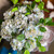 Bundle of three blue real touch hydrangea blooms with a realistic green leaf stem arranged in a decorative vase, featuring lifelike petals and classic Southern-inspired home décor styling.