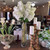 Tall 28-inch white real touch cone hydrangea stem with realistic petals and green foliage, styled in a decorative vase for classic Southern-inspired home décor and floral arrangements.