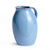 "Elevate your decor with the Napa Home Olivia vase in light blue. Its charming lean and rich reactive glaze add character to any space. Perfect for shelves or consoles. For decorative use only. Inner pot or liner recommended. Shop now!"