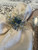 Handcrafted blue and white beaded flower napkin rings with gold wire by Iza Silva
