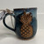 Handcrafted Alabama Vitrified pineapple mug made from wild clay sourced in Pine Apple Alabama by artist Cari Cleckler