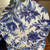 13" French blue floral charger plates featuring a vivid cobalt patter on white. Durable hard plastic design perfect for elegant blue and white tablescapes and timeless Southern entertaining.