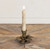 Vintage farmhouse metal bloom taper candle holder with distressed finish, 4 inches tall x 5 inches wide rustic floral design, perfect for southern, farmhouse decor dining tables or cozy home accents. Vintage farmhouse metal bloom taper candle holder with distressed finish, 4 inches tall x 5 inches wide rustic floral design, perfect for southern, farmhouse decor dining tables or cozy home accents.