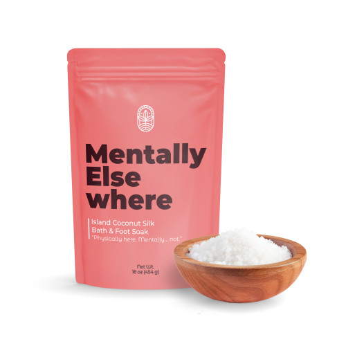 Mentally Elsewhere bath soak pouch with bowl of mineral bath salts on white background