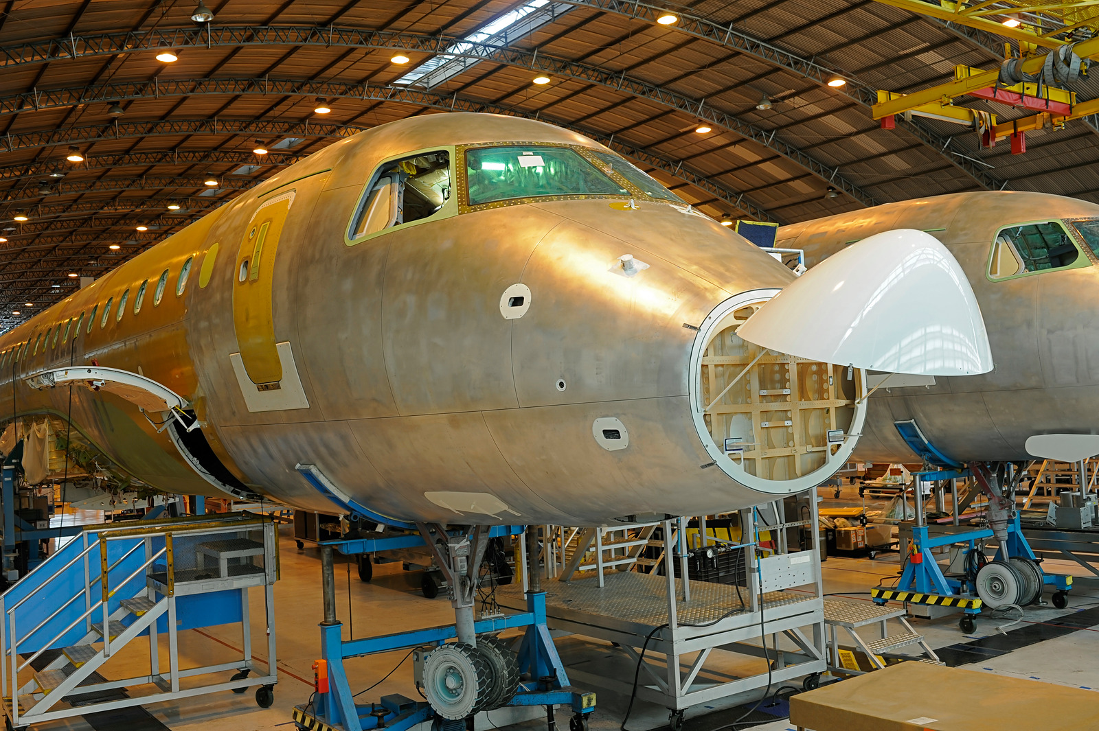 two airplanes in a hangar