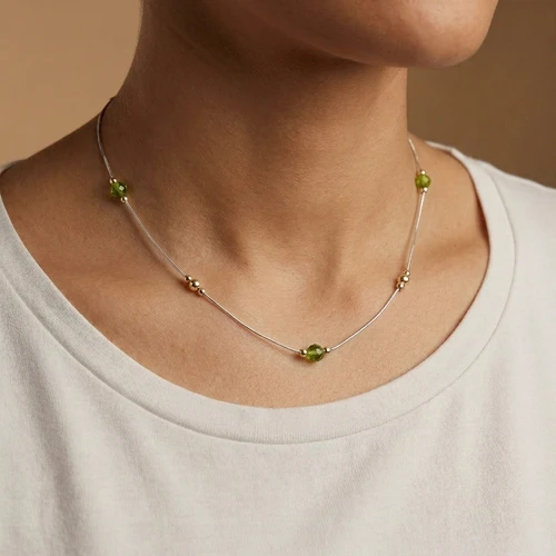 N572-PE- Pretty delicate necklace with Peridot glass and gold beads