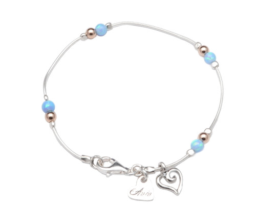 B00942 - OP - Pretty delicate bracelet with Opal and gold beads