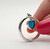 R00711 - Silver ring with dangle charm Opal heart