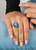 R02059 - Unique ring with spinning part with flower details and large round Opal