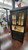 32" CORNER CUPBOARD W/GLASS TOP DOORS-LIGHT- DISTRESS FINISH/BUTTER CREAM/BLACK