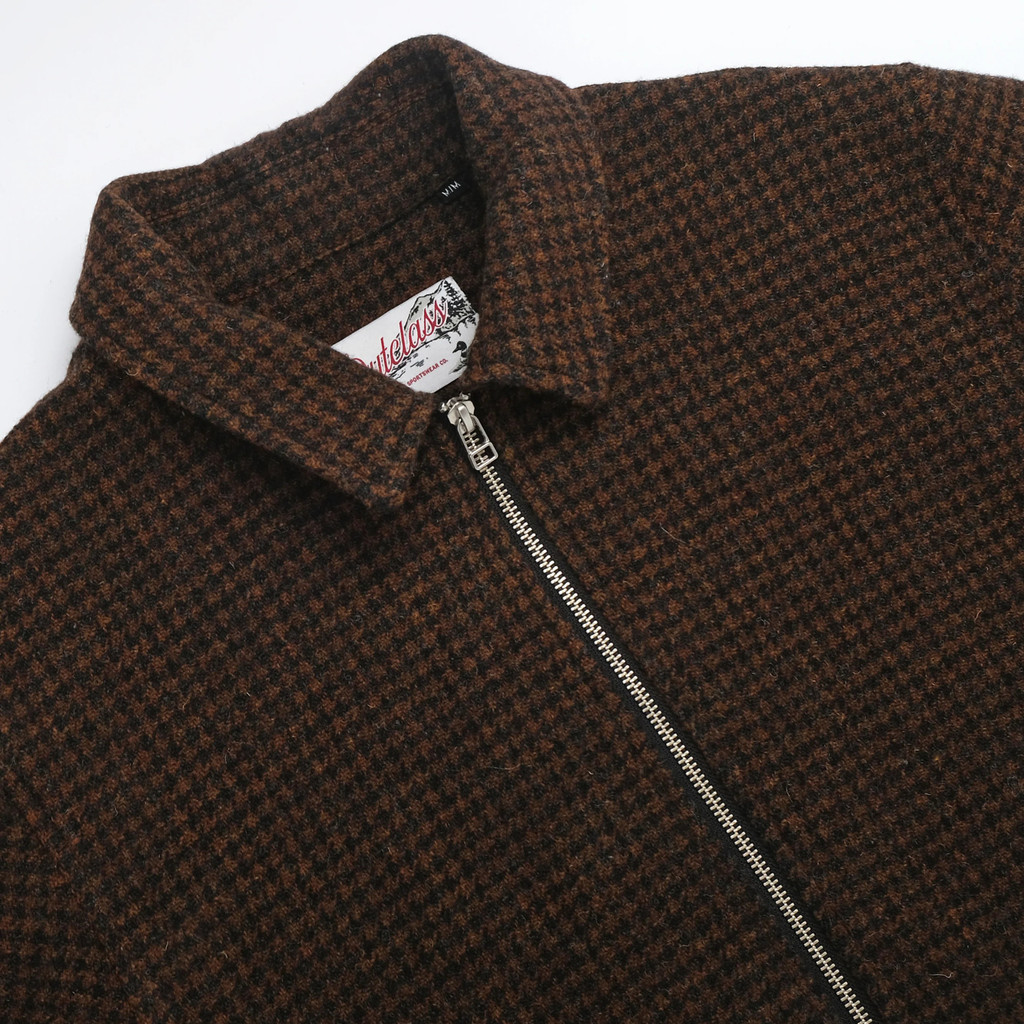 Outclass houndstooth zip wool outerwear.