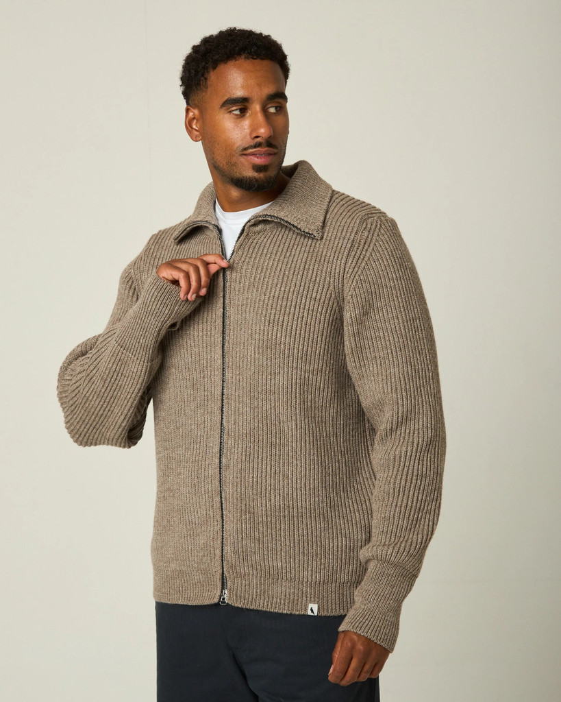 Peregrine Fisherman cardigan in British merino wool.