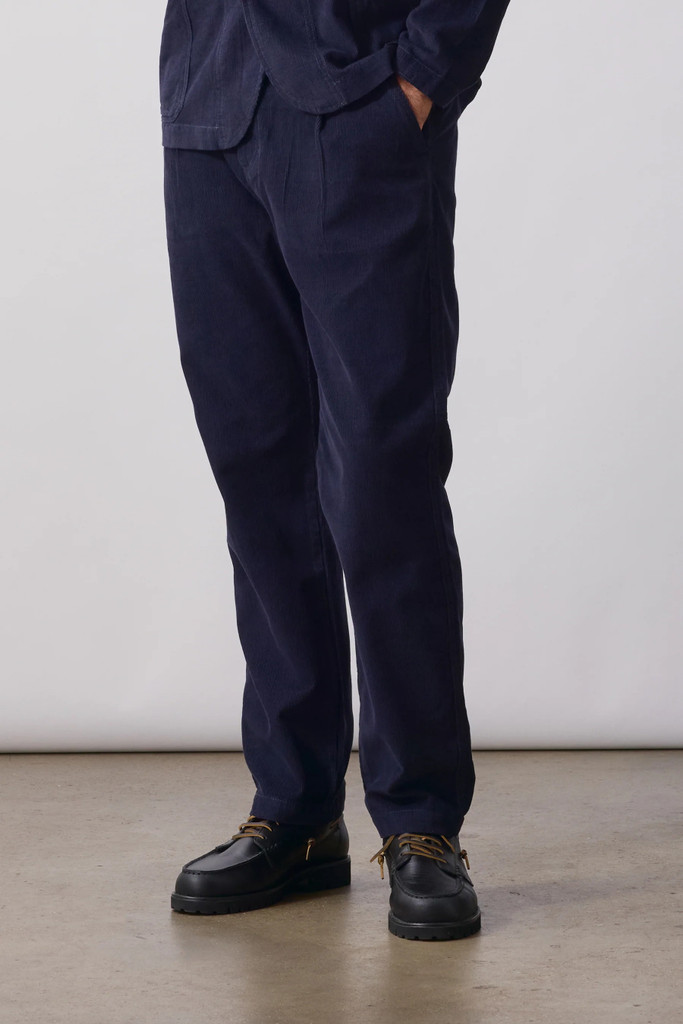 Service Works corduroy waiter pants in navy blue.