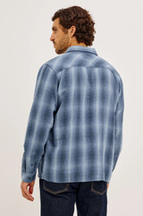 Shop the Rails Owens Shirt in Blue Mist Shadow, a lightweight 100% cotton gauze button-up. This relaxed-fit mens shirt features a soft herringbone texture, classic spread collar, chest patch pocket, and barrel cuffs, offering breathable, go-anywhere everyday style.