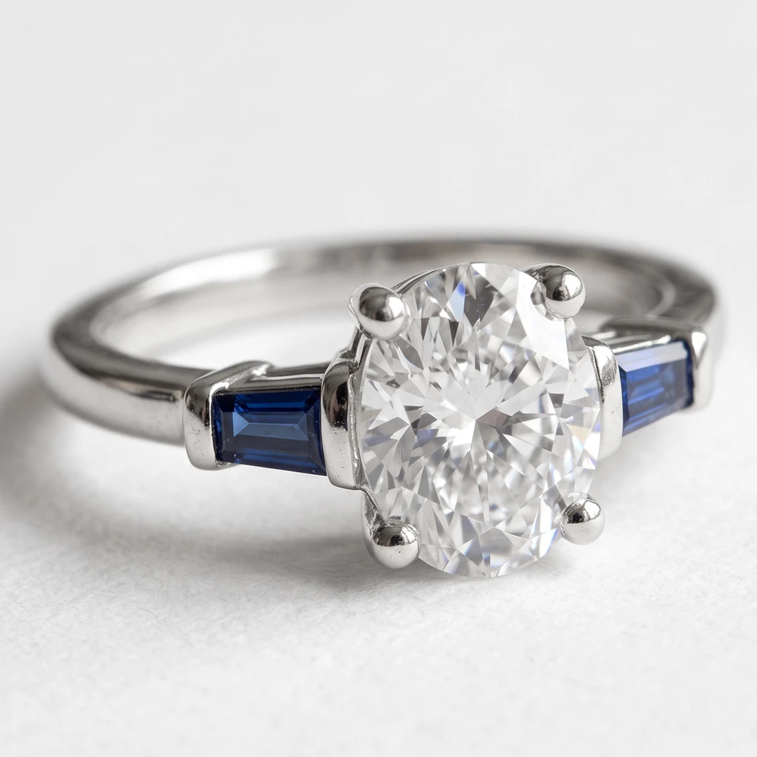 Oval Lab Grown Diamond and Baguette Sapphire 3-Stone Engagement Ring