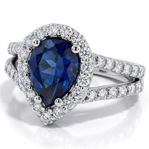 Pear-Shaped Blue Sapphire and Diamond Halo Engagement Ring