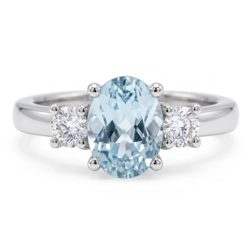 Oval Blue Aquamarine and Diamond Three-Stone Engagement Ring