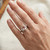 Pear Cut Peach Pink Morganite and Diamond Engagement Ring On Hand