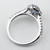 Oval Aquamarine and Raised Diamond Halo Engagement Ring Side