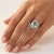 Oval Blue Aquamarine Diamond Halo Statement Ring On Hand
