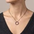 Blue Sapphire Circle Pendant Necklace 14k Black Gold On Model