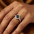 Fancy Black and White Diamond Halo Engagement Ring On Hand