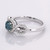 Fancy Blue Diamond Infinity Engagement / Promise Ring Side