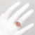 Peach Pink Morganite Halo Engagement Ring Rose Gold on Hand