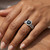Cushion Cut Black Diamond Halo Engagement Ring Set On Hand