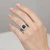 Cushion Cut Black Diamond Halo Engagement Ring Set On Hand