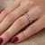 Alternating Red Ruby and Diamond Wedding Ring on Hand