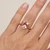 Triangular Cut Peach Pink Morganite Solitaire Engagement Ring On Hand