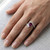 Unique Trilliant-Cut Pink Sapphire Diamond Engagement Ring On Hand