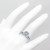 Cushion Aquamarine Diamond Halo Engagement Ring Set on Hand