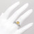 Cushion Yellow Sapphire Diamond Halo Engagement Ring Set on Hand