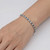 Alternating Blue and White Diamond Tennis Eternity Bracelet On Model