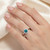 Fancy Blue White Diamond Halo Engagement Ring On Hand