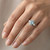 Oval Blue Aquamarine Diamond 3-Stone Engagement Ring on Hand