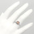 Petite Peach-Pink Morganite Diamond Halo Engagement Ring On Hand