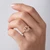 Petite Peach-Pink Morganite and Diamond Halo Engagement Ring in Rose Gold On Hand