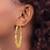 Large 14k Yellow Gold Bamboo Hoop Earrings on Model