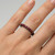 Red Ruby Eternity Wedding Band 14k Black Gold Ring on Hand