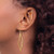 Long Twisted 14k White Gold Dangle Earrings on Model