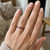 Fine Channel-Set Ruby Eternity Wedding Band 14k Yellow Gold Ring On Hand